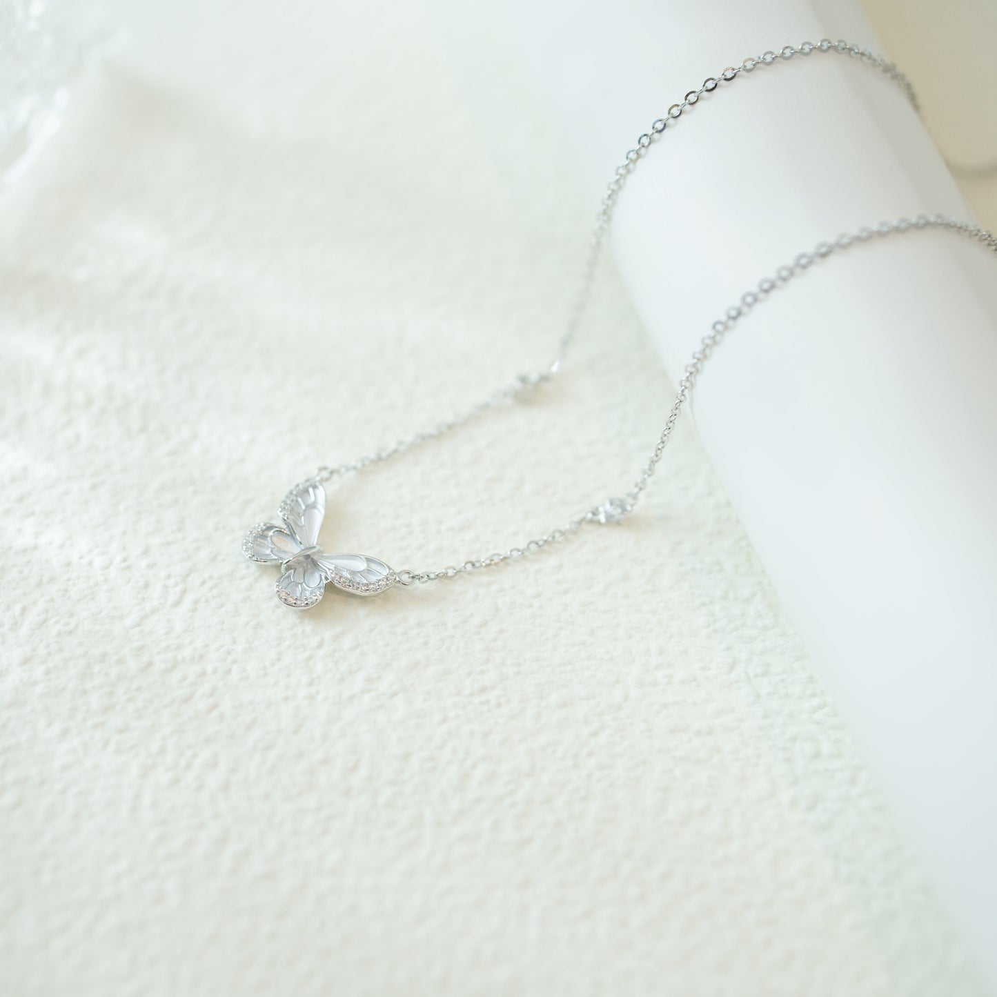 Light blue butterfly necklace