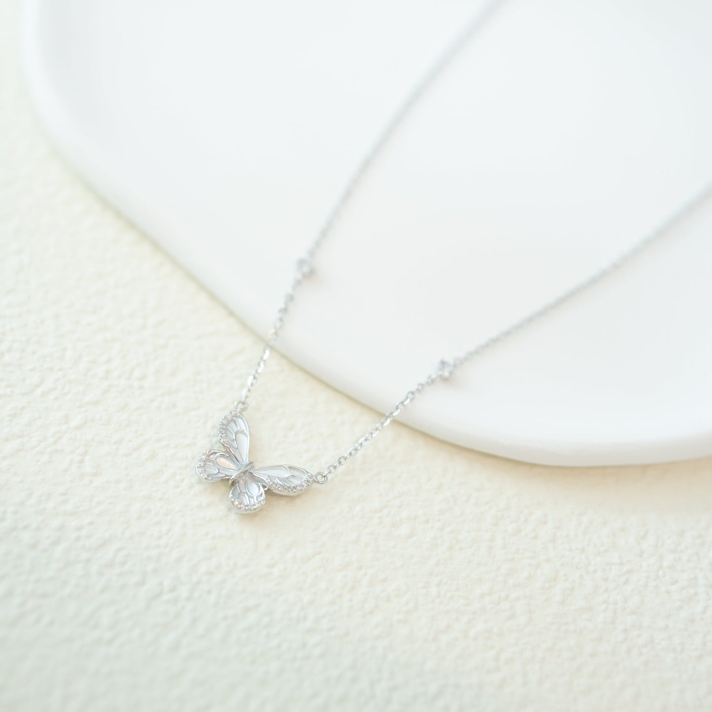 Light blue butterfly necklace