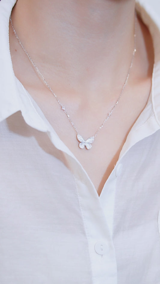 Light blue butterfly necklace